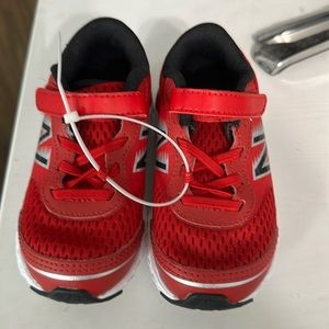 New Balance red sneakers